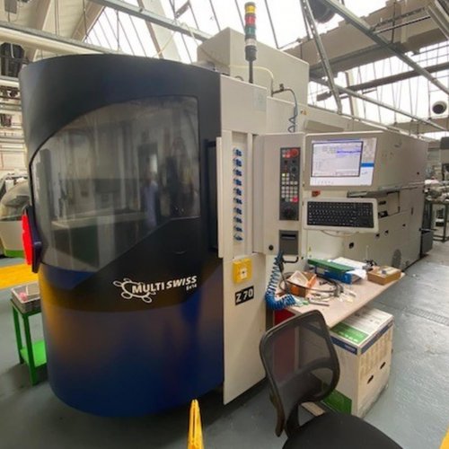 tornio a CNC TORNOS MULTISWISS 6X14